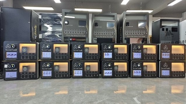 Rows of fragrance vending machine units stacked in the SCENTLE warehouse